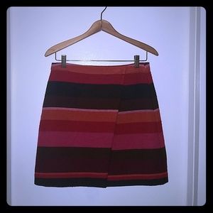 Fully lined wool wrap around skirt.